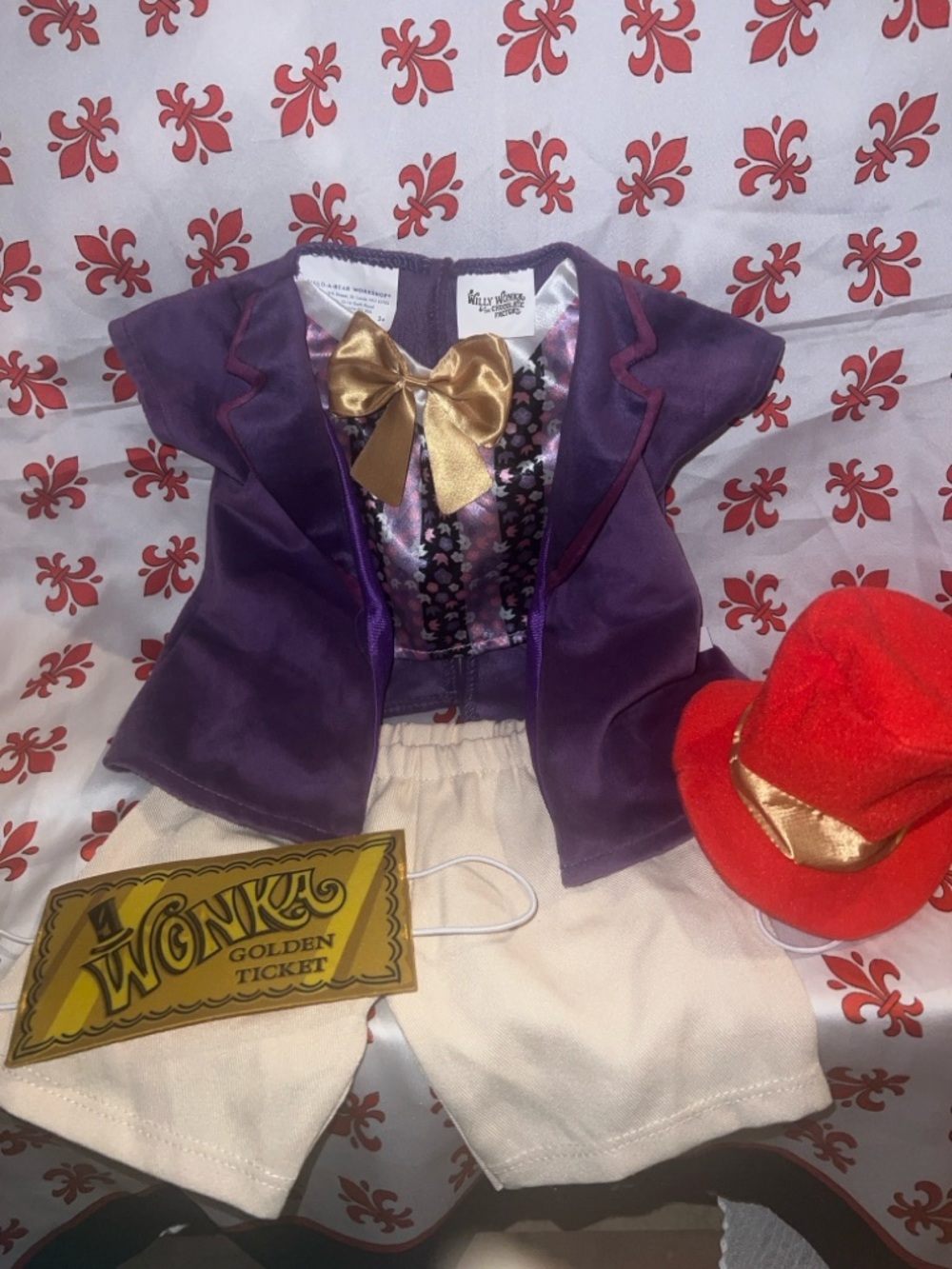 Purple and Gold Kids Costume Jacket with Cream Shorts and Red Hat